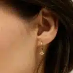 Evil Eye Huggie Earrings in 14k gold PVD, view 3